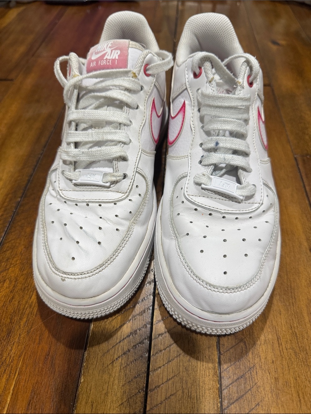 Nike Kids White Sneakers with Pink Swoosh